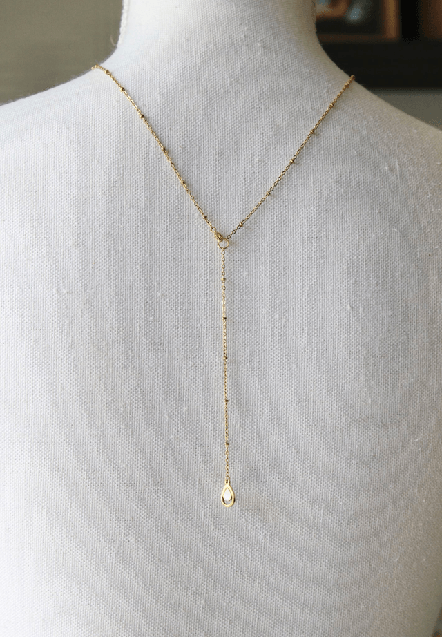 Collier de dos - Coquillage
