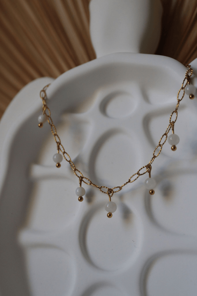 Bracelet de cheville perles de coquillages