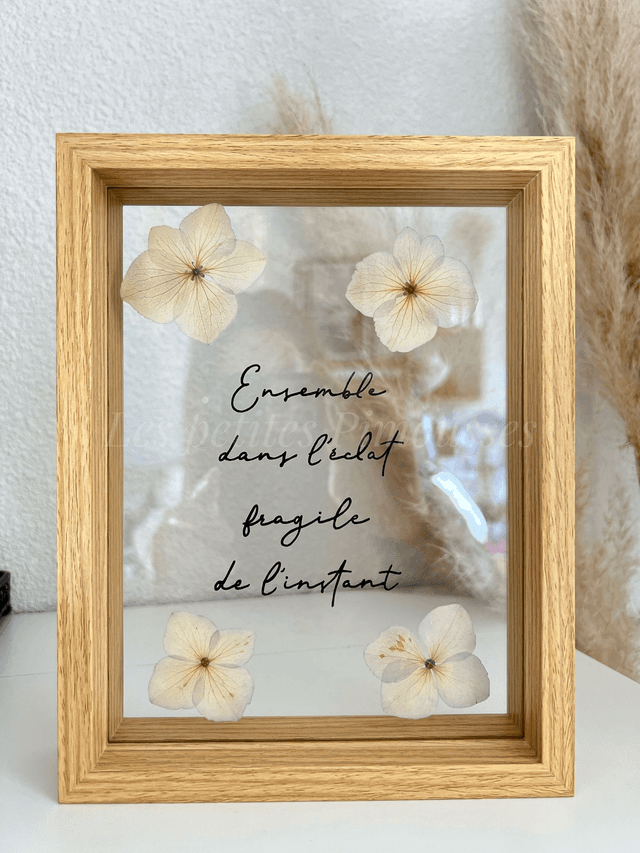 Cadre fleurs séchées et citation « Ensemble…